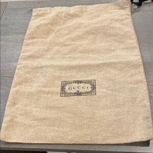11.5” x 17” beige Gucci drawstring dustbag